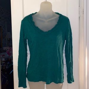 Chelsea and Theodore long sleeve green top with ruffle neckline